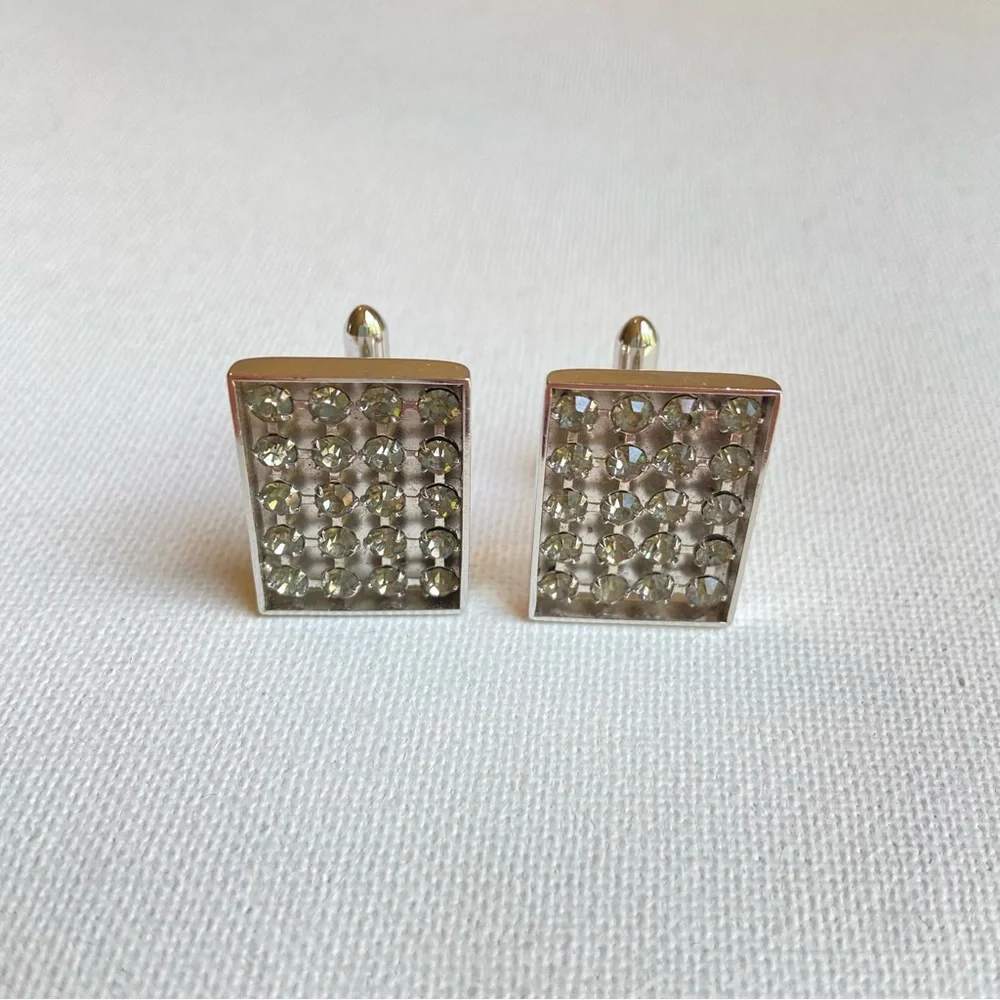 SWANK gray rhinestone cuff links in rectangular silvertone metal setting signed